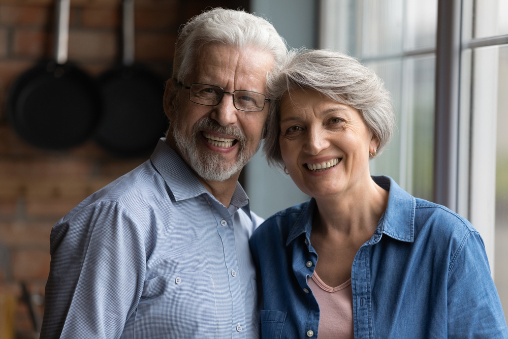 couple smiling with healthy teeth family dentist Woodlands TX