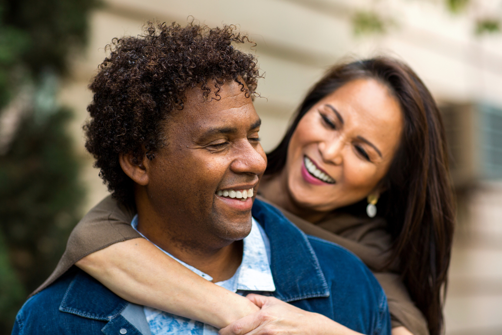 Happy couple smiling together after dental care The Woodlands TX